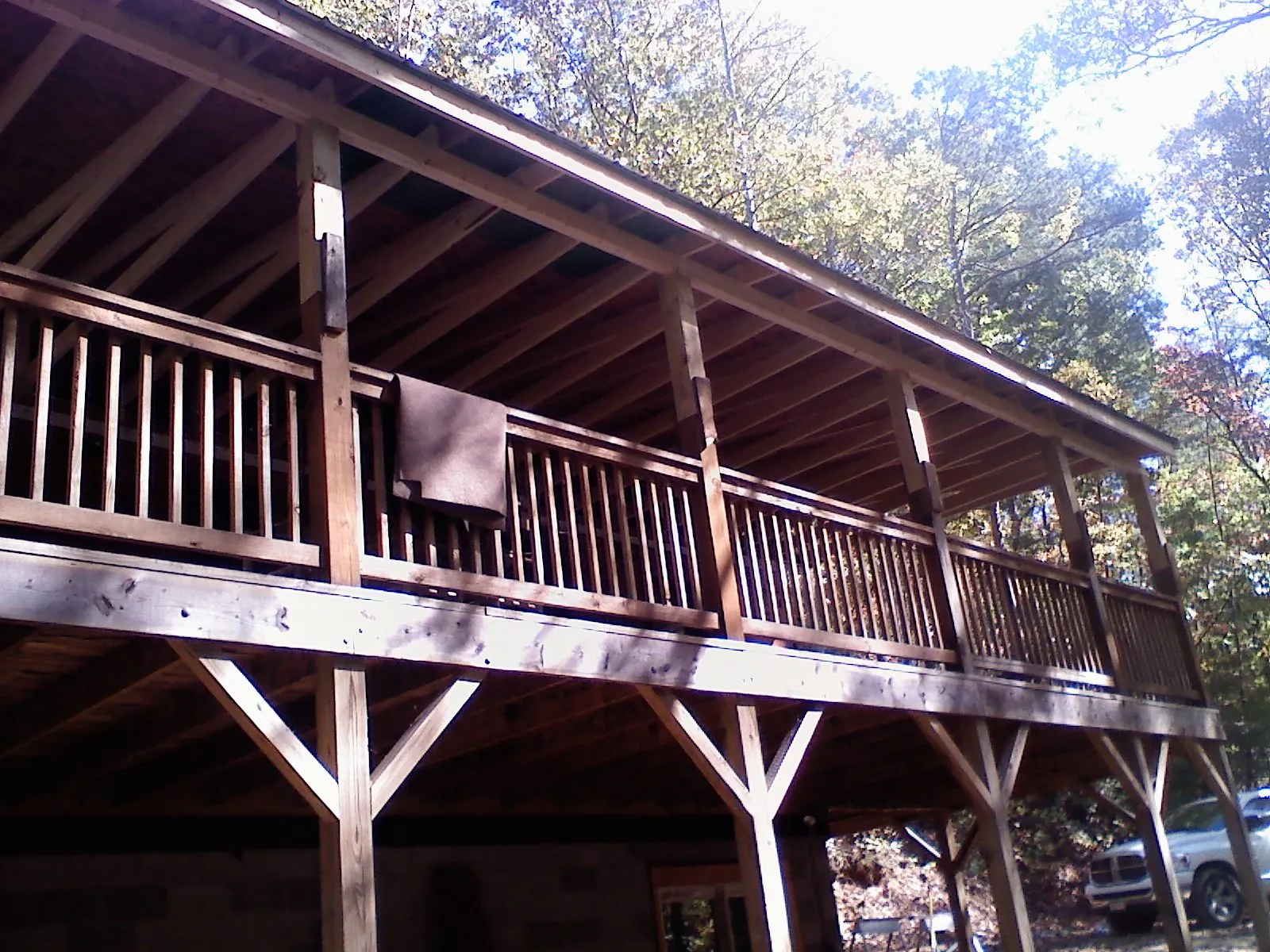 Timber framing under a new elevated porch and deck — Roof Leak Repair in Mcville by Roofing Brothers
